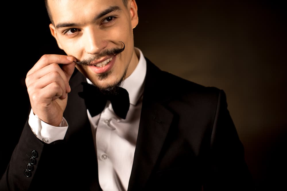 smiling man in tuxedo